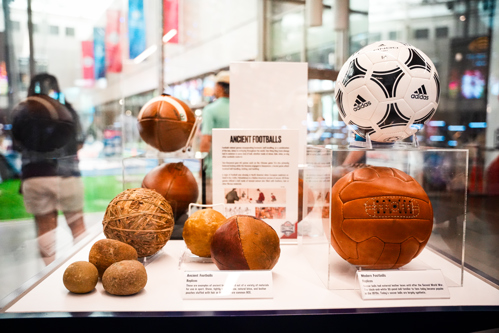One Name Two Games Exhibit Case: Ancient Footballs